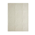 beige area rug showing patterns
