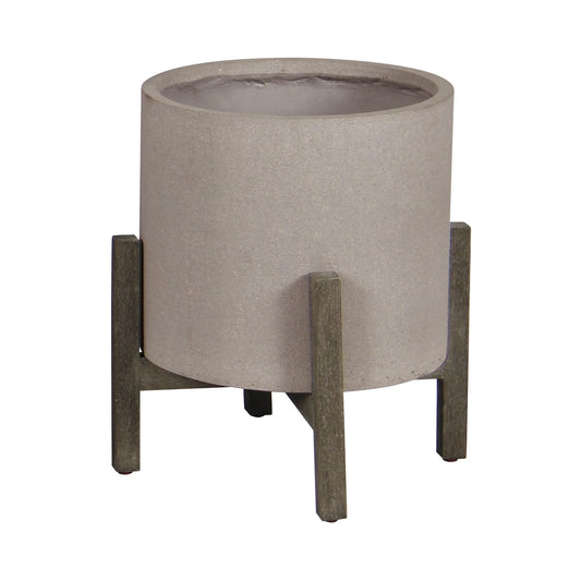 Concrete planter with wooden legs on a white background
